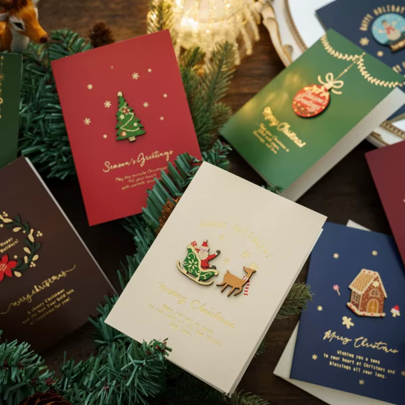 Luxury Christmas Wood Charm Gold Foil Textured Cotton Paper Holiday Greeting Card Set Snowflake Star Reindeer Custom Printing